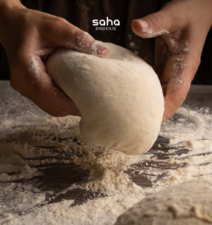 Hand shaping dough